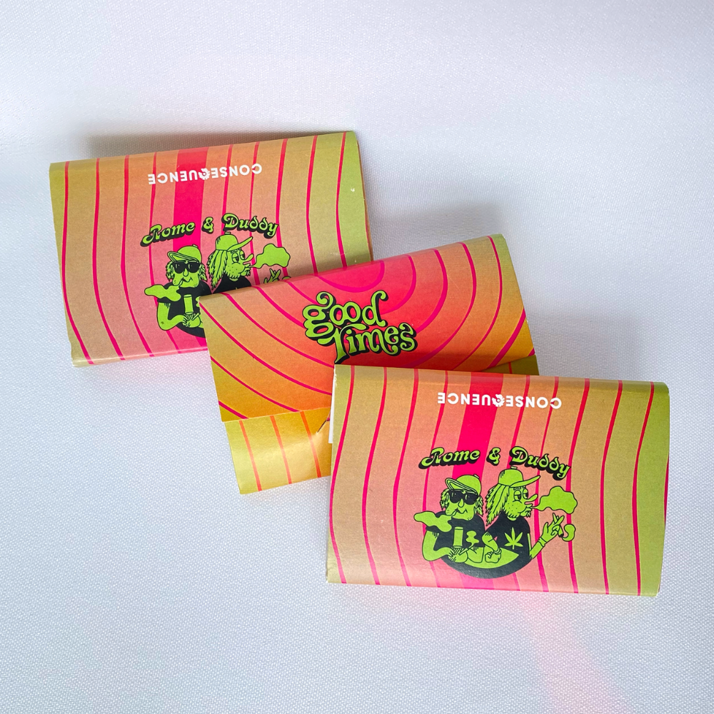 Three packs of Good Times rolling papers with colorful packaging featuring graphics and text.